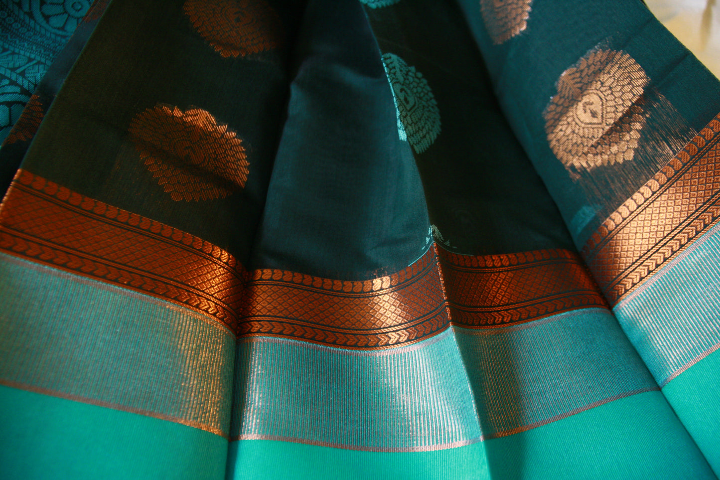 Dark Green Pure Cotton Saree with Aqua Blue and Copper Zari work