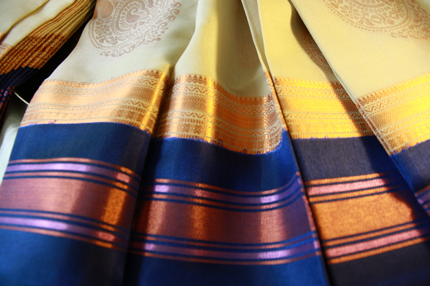 Cream Beige Cotton Saree with Deep Blue border and Light Copper work