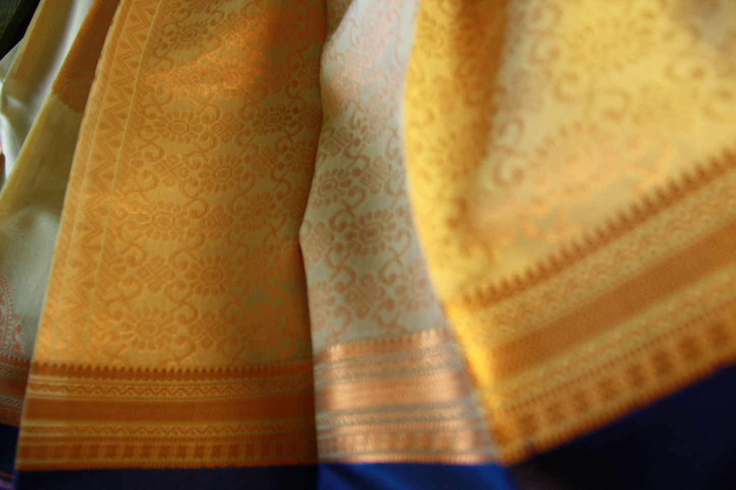 Cream Beige Cotton Saree with Deep Blue border and Light Copper work