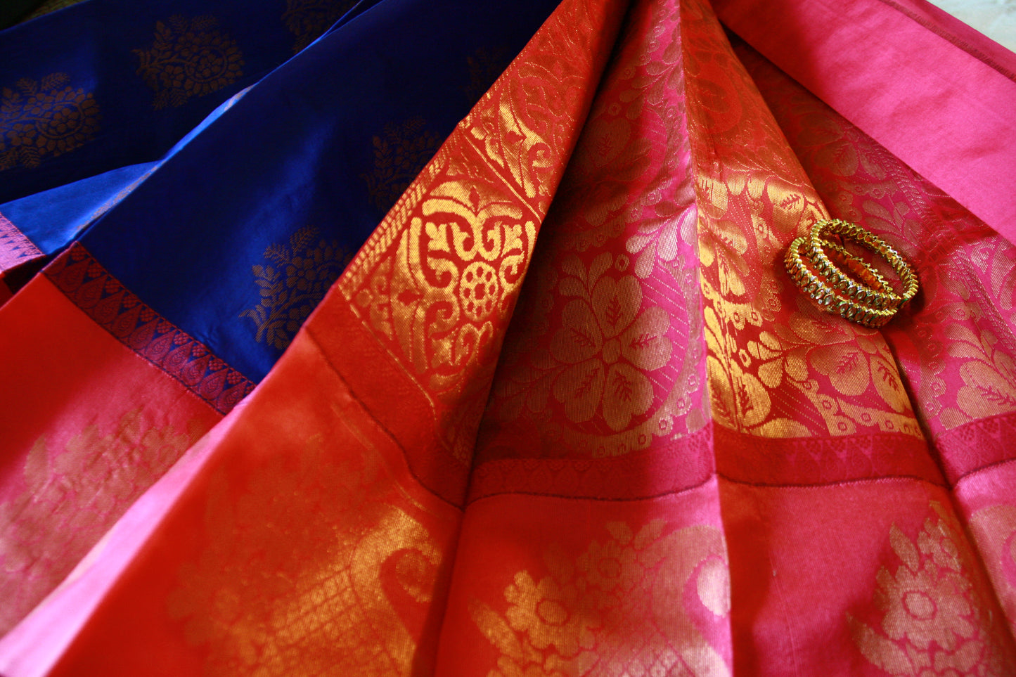 Peacock Blue Cotton Saree with Big Rose Pink Border and Golden work.