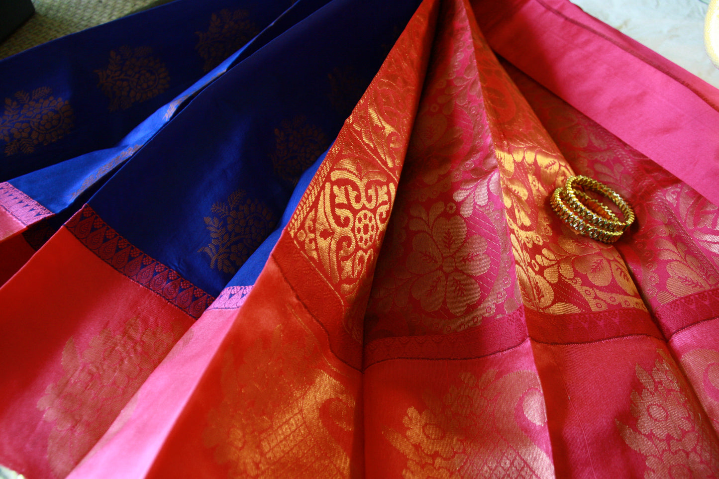 Peacock Blue Cotton Saree with Big Rose Pink Border and Golden work.