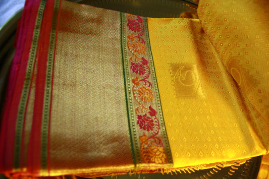 Vibrant Yellow Pure Silk Kanjivaram Saree with Pink and Golden Zari work. | SILK MARK CERTIFIED